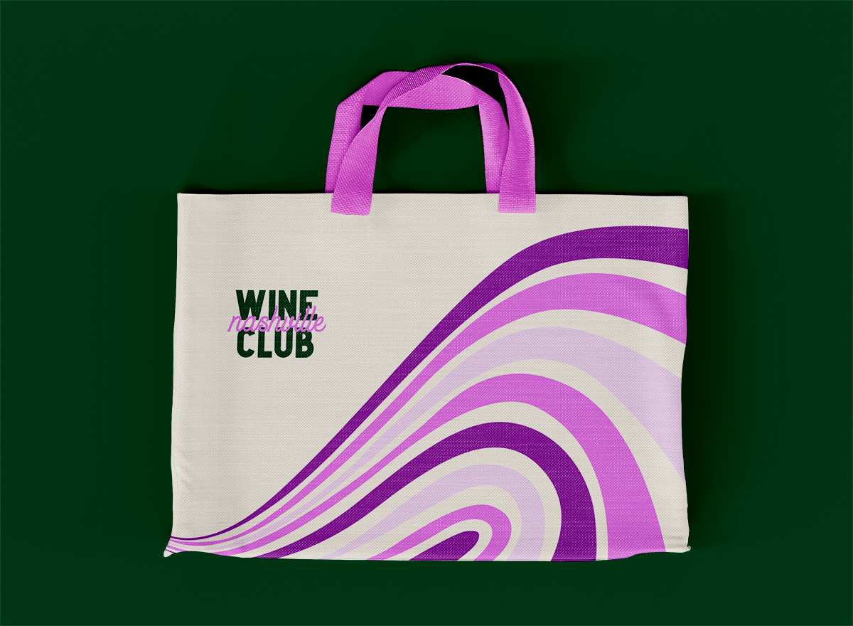 A tote bag on a dark green background.